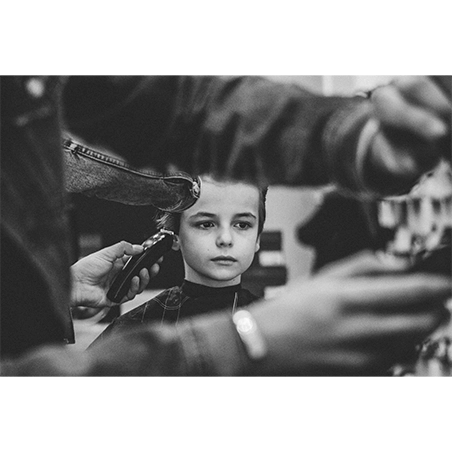 Photo d'une coupe d'un enfant au Barber Shop : Chez Clem. Photo dans la page Histoire